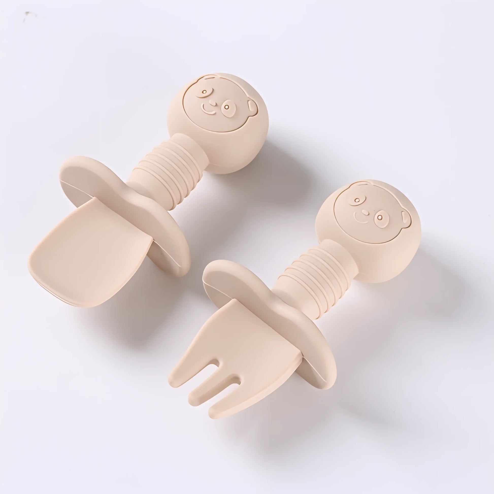 Baby's first cutlery, soft silicone spoon and fork with easy-grip wooden handles