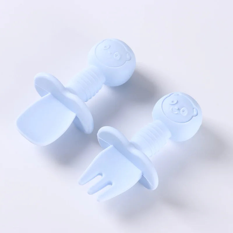BPA-free baby mealtime essentials: silicone spoon and fork with wooden grips