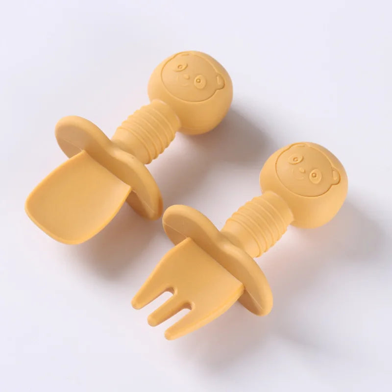 Infant self-feeding kit: silicone spoon and fork with child-friendly wooden handles