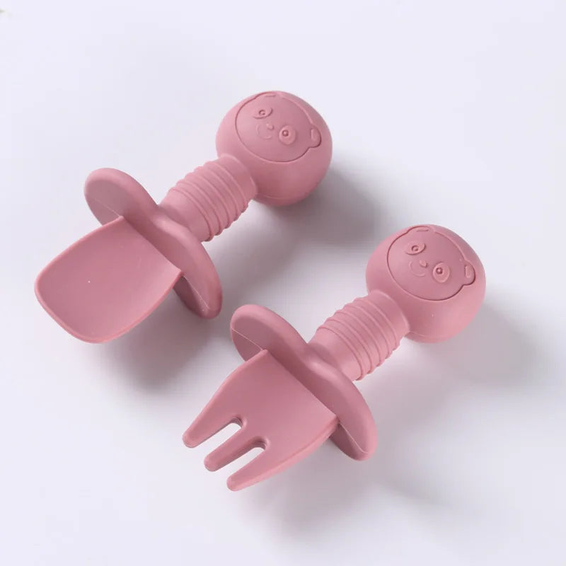 Soft silicone tip spoon and fork for babies, paired with elegant wooden handles
