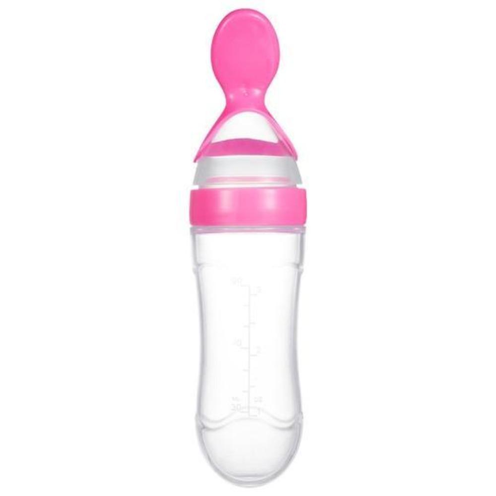 White and clear baby squeeze feeding spoon bottle, essential for quick and mess-free feeding