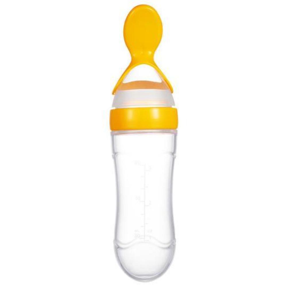Close-up of silicone spoon on baby squeeze bottle, showing soft tip for gentle infant feeding