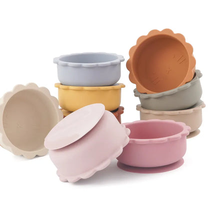 Baby silicone suction bowl with lid, bpa-free, on a wooden high chair tray