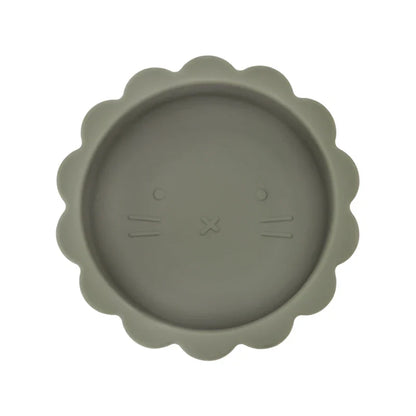 Baby silicone suction bowl on a table, illustrating its non-slip feature