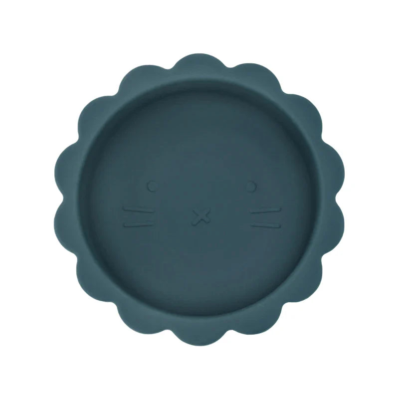 Child reaching for the bpa-free baby silicone suction bowl during feeding