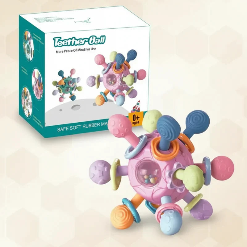 Portable white baby silicone teether grip ball, a must-have infant toy for teething babies.