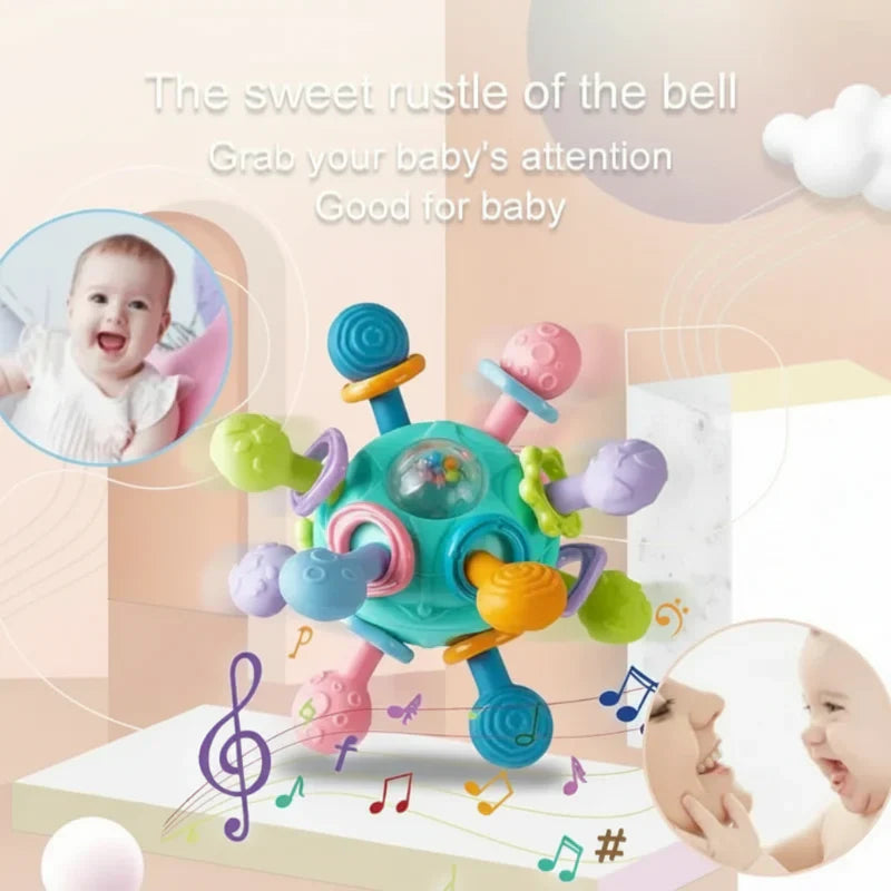 Yellow baby silicone teether grip ball, portable and easy for small hands to grasp.
