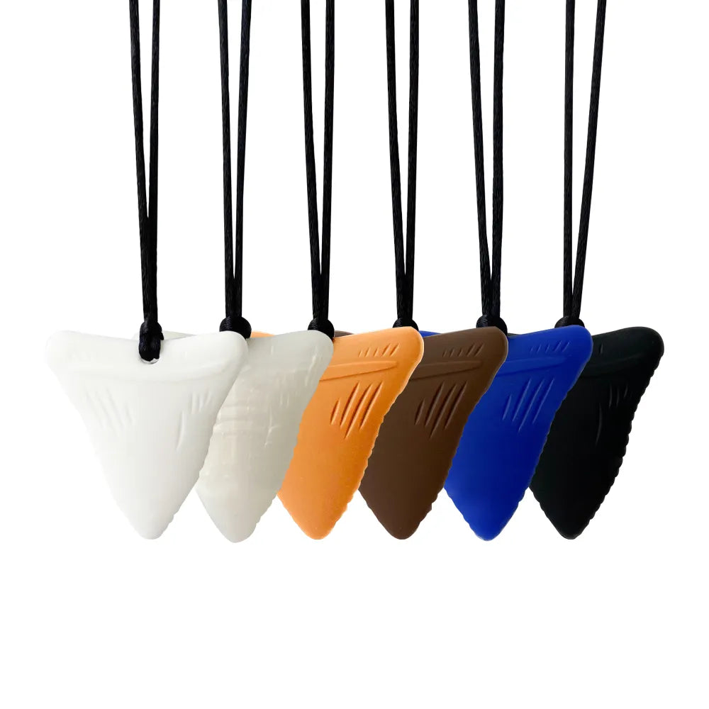 Baby silicone teether necklace in pastel pink, textured for soothing relief, ideal for nursing moms.