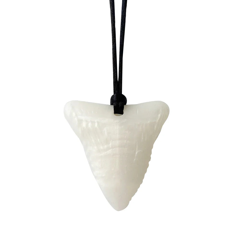 Baby silicone teether necklace in purple, providing safe and effective oral stimulation for infants.