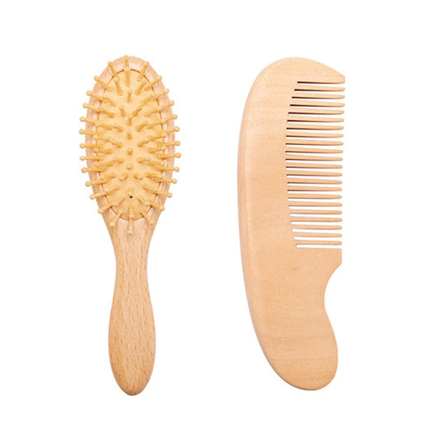 Healthy baby scalp care with a gentle, soft brush and anti-static wooden comb, natural materials
