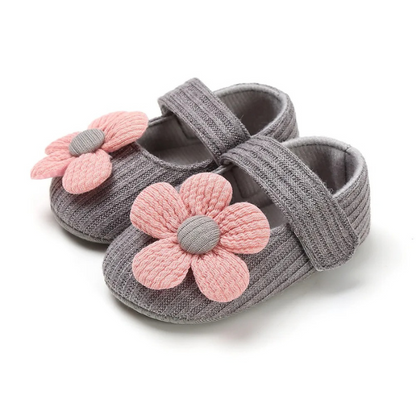 Soft sole infant footwear in a vibrant color, designed for breathability and anti-slip safety.