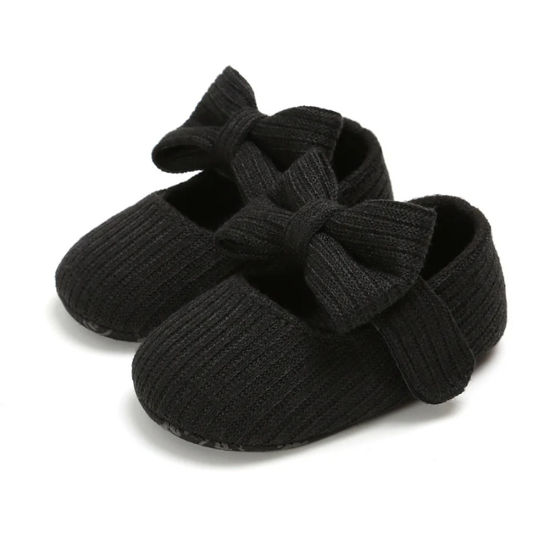 Stylish baby fashion shoes with soft sole, anti-slip features, and breathable material for infants.