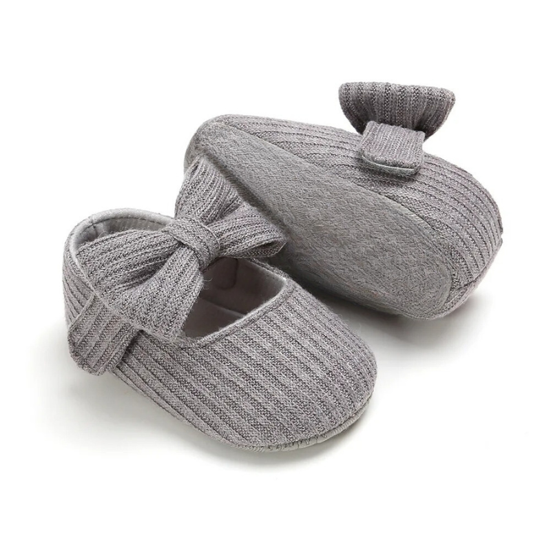 Infant boy's soft sole anti-slip breathable shoes, offering comfort for growing feet.