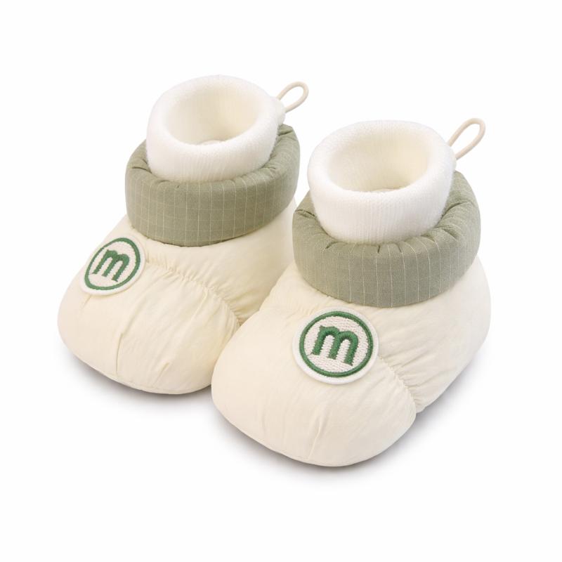 Infant footwear: soft sole first walking shoes, fleece-lined for warmth & comfort, unisex design.