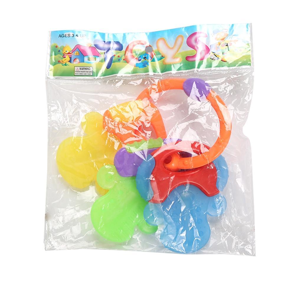Teething baby happily chewing on a cold gel pacifier, providing instant relief