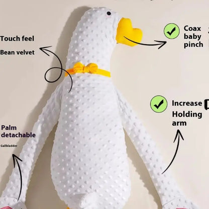 Gentle flapping baby sleep aid in the shape of a white goose plush, designed to comfort infants.