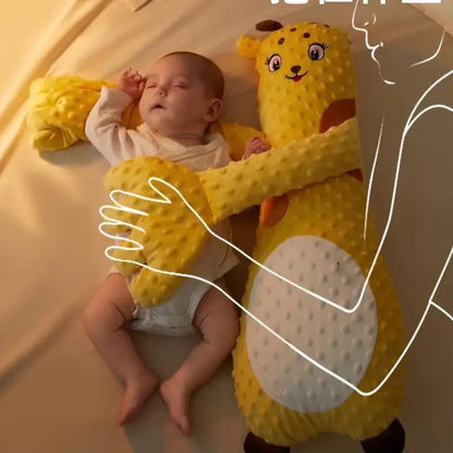 White goose plush sleep aid pillow, shown with remote control, ideal for baby sleep training and comfort.