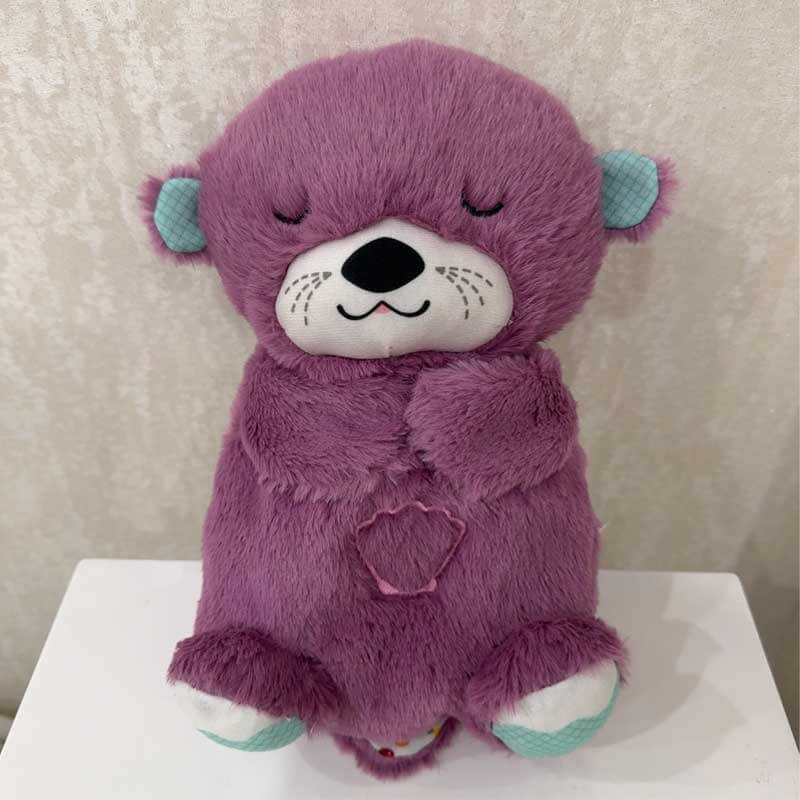 Detailed shot of the face of the rhythmic breathing otter plush, showing peaceful expression