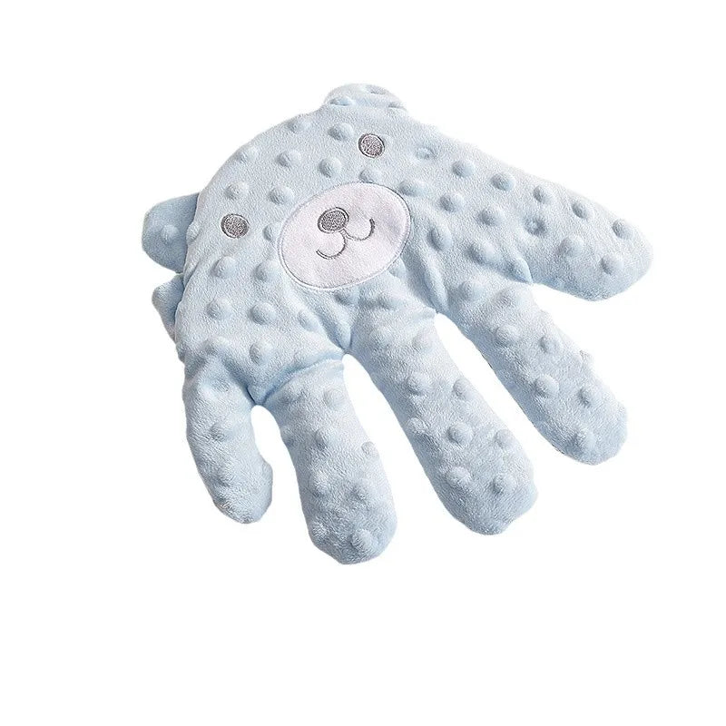 Close-up of Baby Soothing Patting Pillow, neutral color, comforting texture for infant sleep
