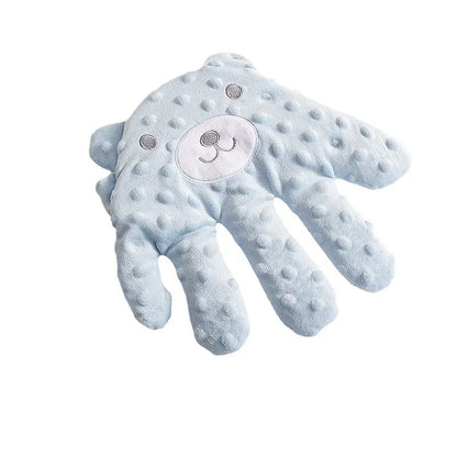Close-up of Baby Soothing Patting Pillow, neutral color, comforting texture for infant sleep