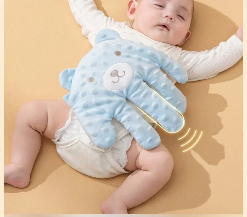 Newborn sleeping soundly on a Baby Soothing Patting Pillow, aiding peaceful rest & anti-startle
