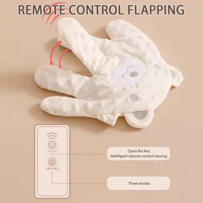 Child's hand gently patting the Baby Soothing Pillow, demonstrating its soothing function for sleep