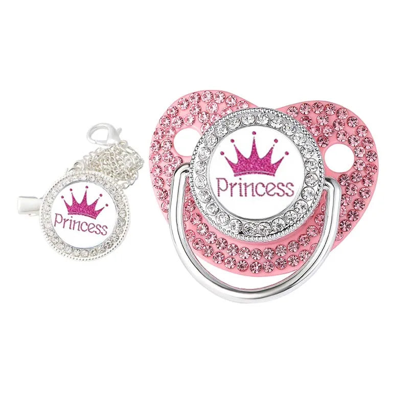 Full view of pink sparkle pacifier clip and BPA-free silicone soother set, a must-have baby accessory