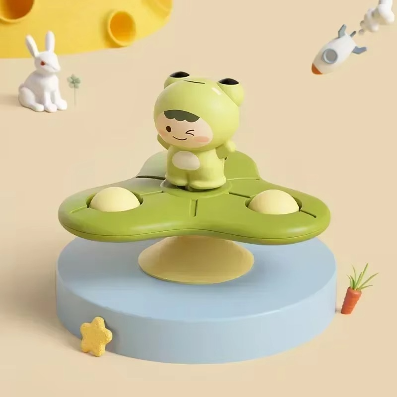 Baby activity toy: orange and purple spinning suction cup on a high chair, encouraging calm play