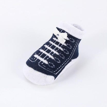 Cute newborn essentials: gray and yellow sports shoe design baby socks made from comfortable cotton
