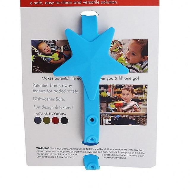 Secure non-toxic silicone baby pacifier holder in a playful star design for infant care.