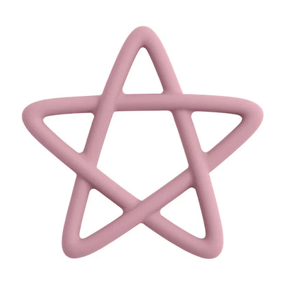 Baby holding an ergonomic star silicone teether, designed for easy grip and gum relief