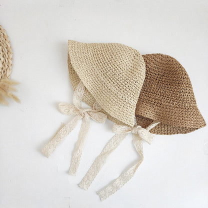 Adorable baby straw hat, an essential summer accessory for infants on sunny adventures.