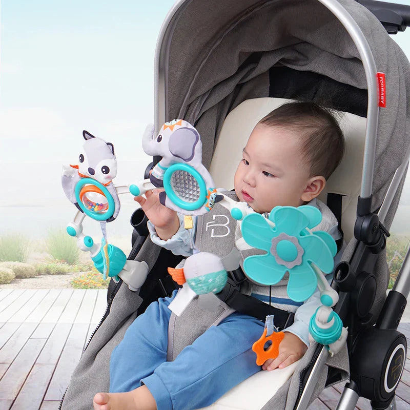 Clip-on baby toy for strollers, musical arch mobile with activities for sensory development