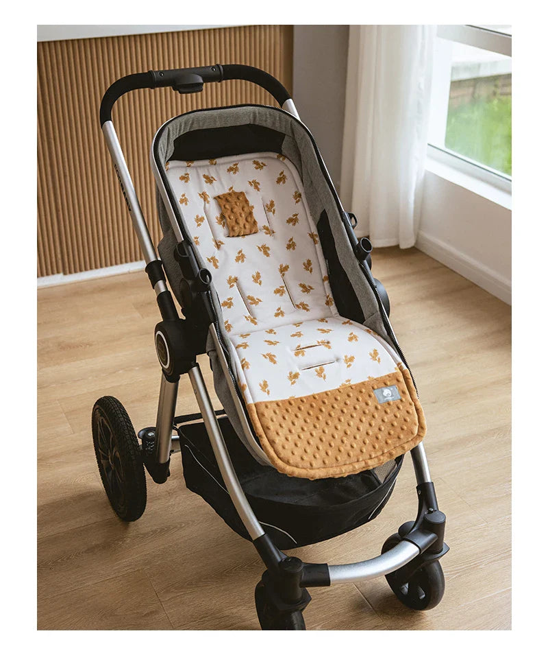 Baby stroller cushion, soft cotton blend liner for infant comfort and support, cute patterns.
