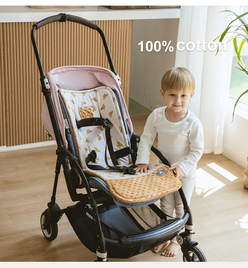 Thick padded baby stroller cushion, cotton & polyester liner for enhanced infant comfort.