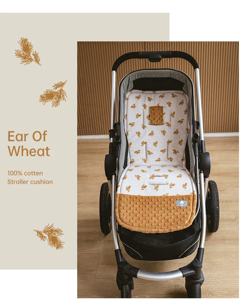 Cartoon themed baby stroller cushion, cotton blend liner for playful infant travel comfort.