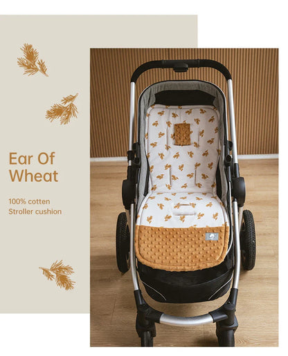 Cartoon themed baby stroller cushion, cotton blend liner for playful infant travel comfort.
