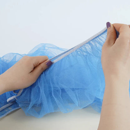 Universal white mosquito net for baby strollers, an outdoor baby essential for insect-free travel.