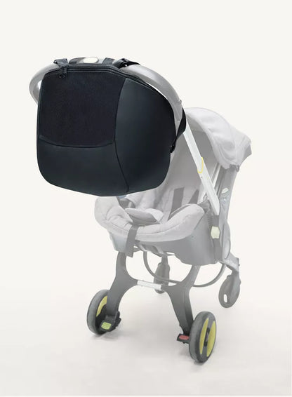 Black baby bag for strollers, featuring strong velcro straps and secure compartments for valuables