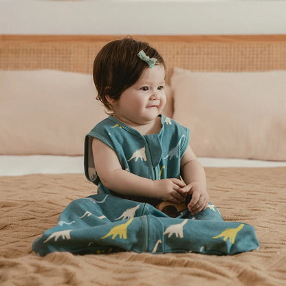 Sleeveless cotton baby sleep sack with secure zipper, designed for summer comfort, anti-kick, newborn essential.