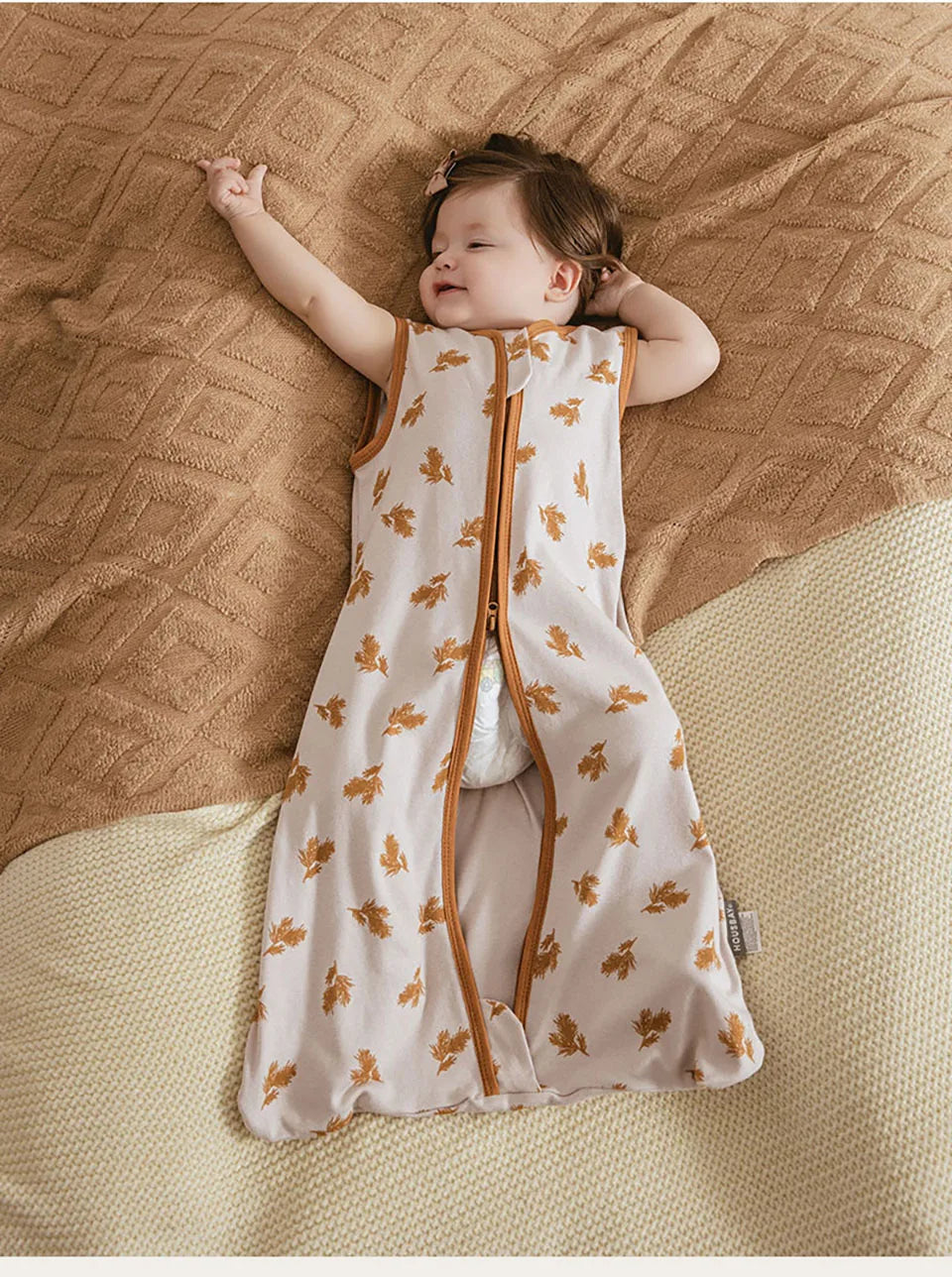 Baby sleep sack with open bottom for easy diaper changes, breathable cotton, perfect for summer sleepwear.