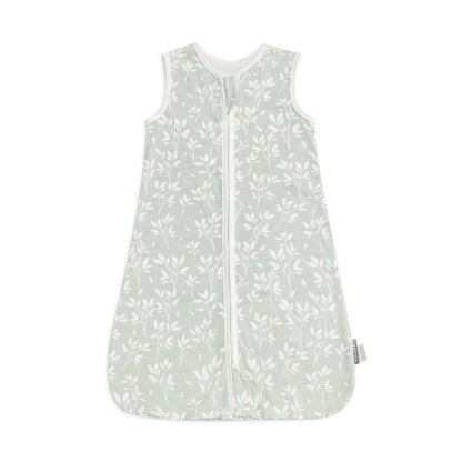 Adorably sleeping baby in a sleeveless cotton summer sleep sack, promoting safe and comfortable sleep.