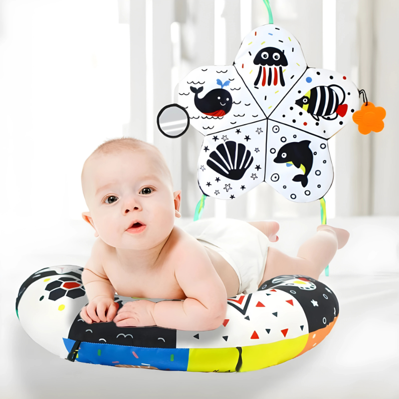 Baby tummy time play pillow for infants with high contrast patterns, promoting muscle growth & visual stimulation.