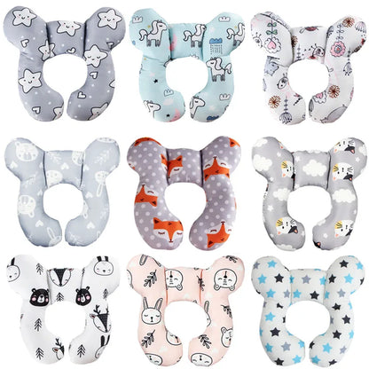 Comfortable baby U-shape travel pillow in a stroller, providing neck protection for a sleeping toddler