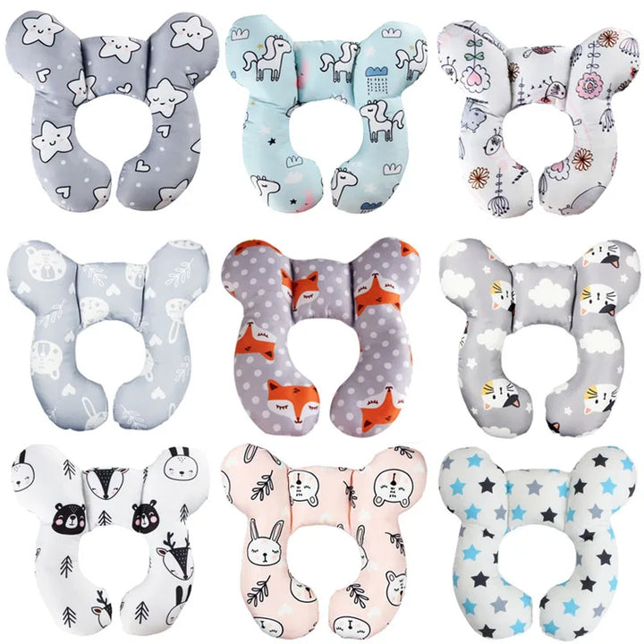 Comfortable baby U-shape travel pillow in a stroller, providing neck protection for a sleeping toddler