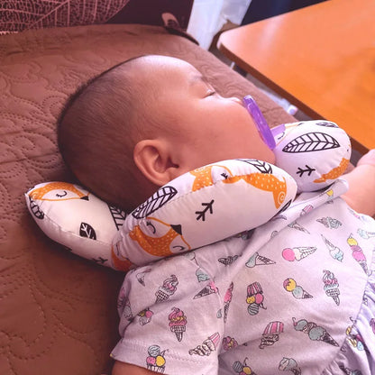 Close-up of U-shape baby travel pillow, breathable fabric, ideal for car seats and stroller accessory