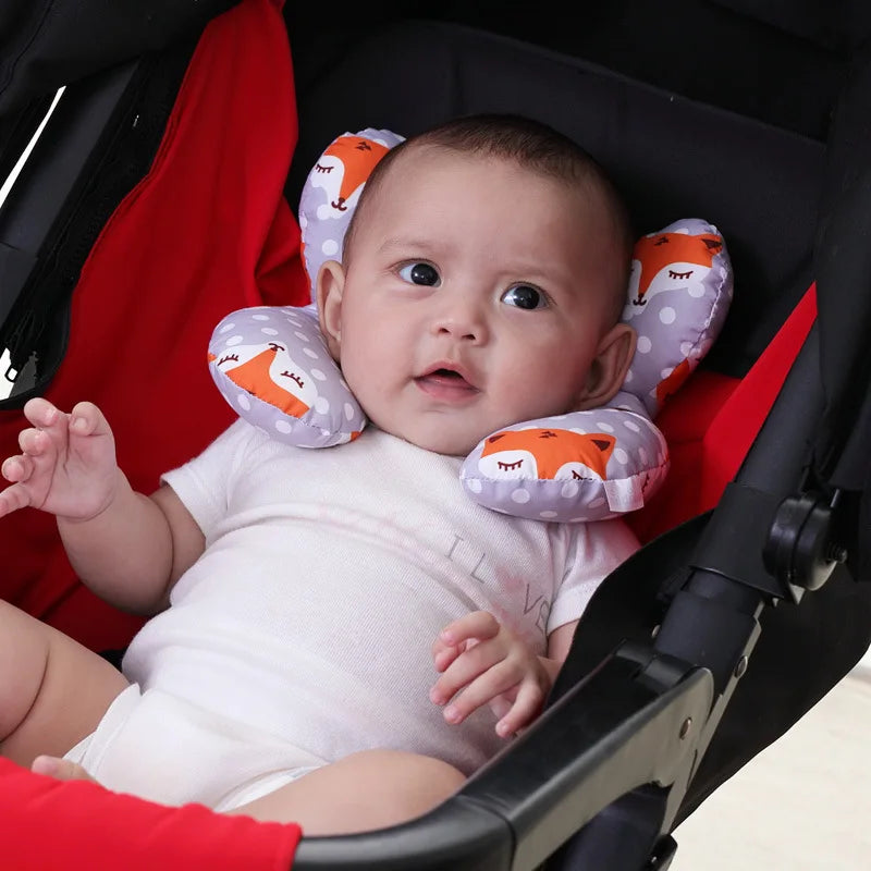 U-shape infant head support in pastel blue, designed for car seat comfort and baby neck protection