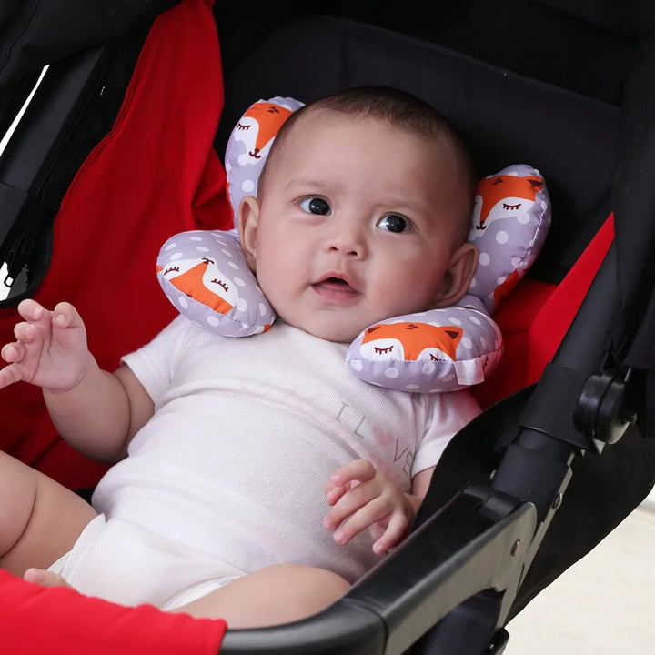 U-shape infant head support in pastel blue, designed for car seat comfort and baby neck protection