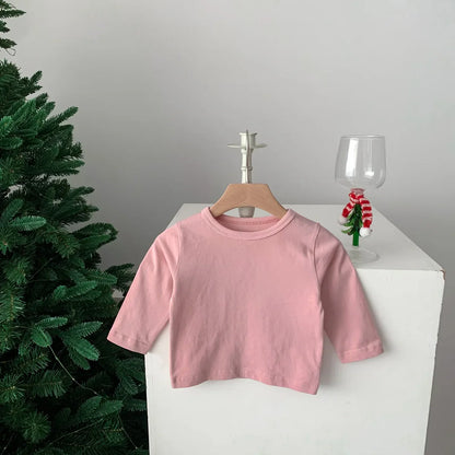 Baby unisex cotton T-shirt, plain orange, ideal for warm weather infant clothing.
