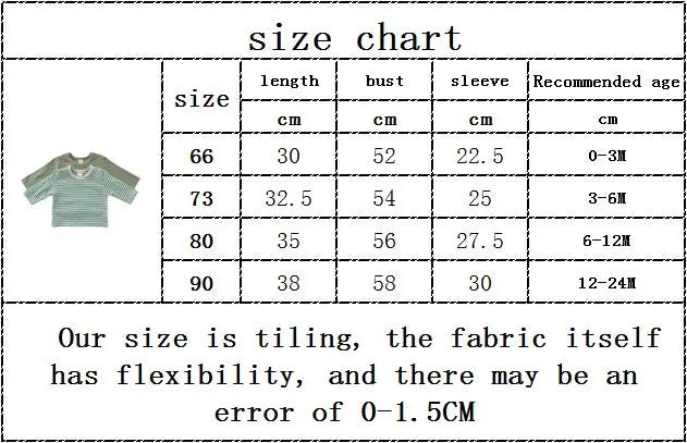 Hanging display of various colors of plain cotton short sleeve unisex baby T-shirts.